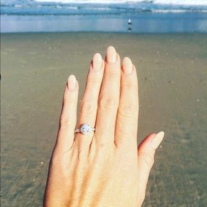 More photos to come - certified 1 carat diamond engagement ring.